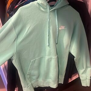 Green Nike Hoodie, size Medium in men’s.